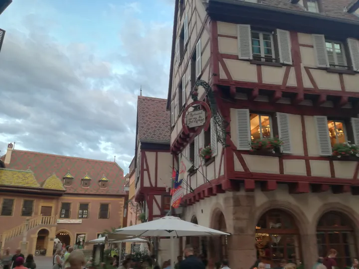 Folklore dancing in the evening at Colmar, Alsace (France)